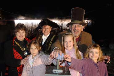 Peter Abraham (Lord Mayor of Bristol), Pearl Abraham (the Lady Mayoress), Adam Hart-Davis, and the three competition winners Alicia Winfield, Annie Williams and Rosy Owens turning on the new Clifton Suspension Bridge lights (Photos: Martin Chainey)