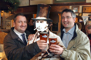James Taljaard of Arts & Business South West and James Durie of Business West toasting Brunel with Butcombe Brewery beer