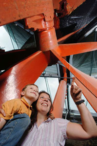 Mother and child looking at the ss Great Britain's propellor
